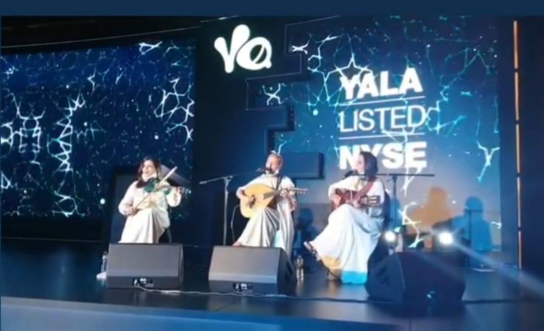 Nina Oud on stage with her band at a concert in Dubai