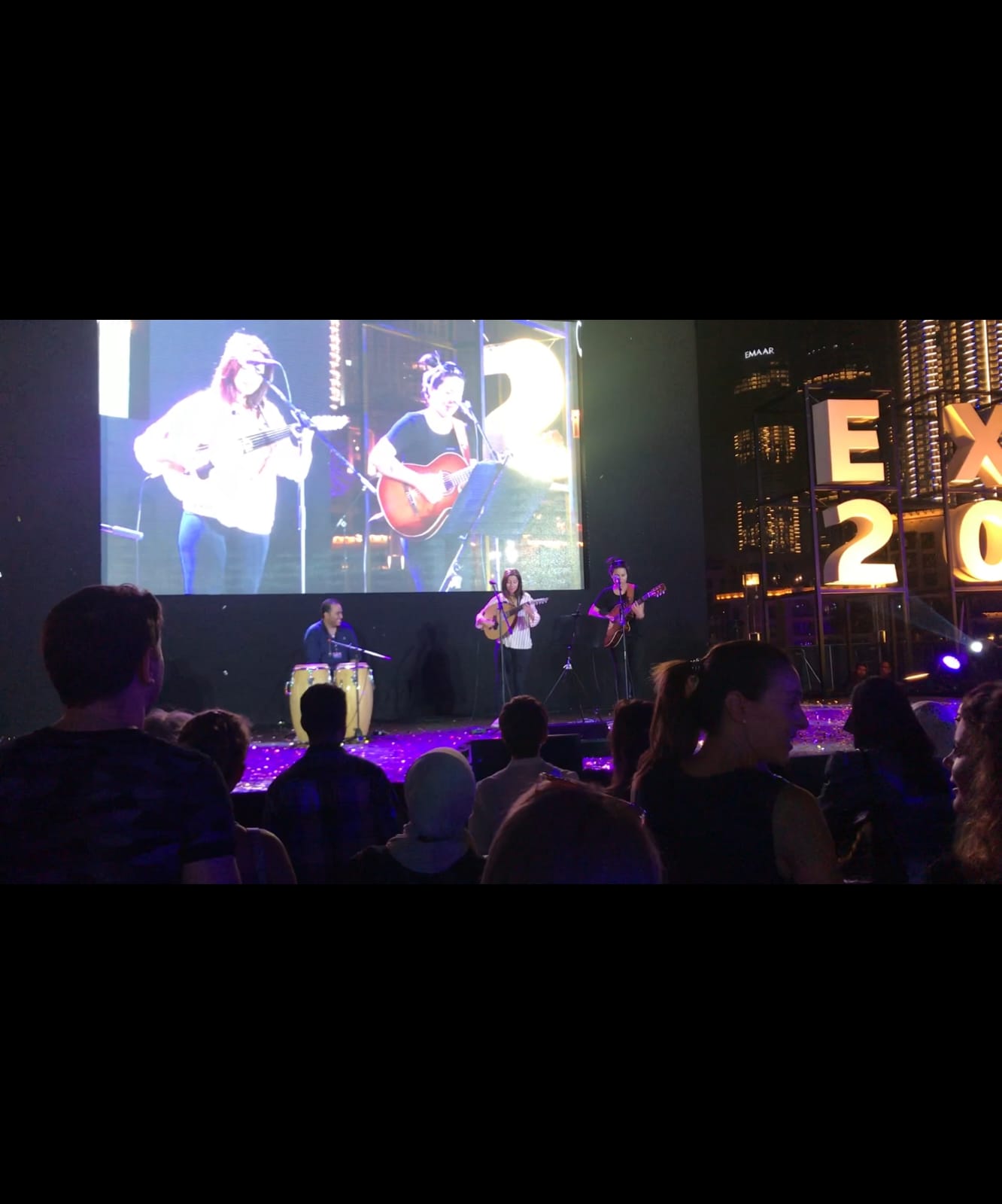 Nina Oud performing at EXPO Dubai on a large open-air stage